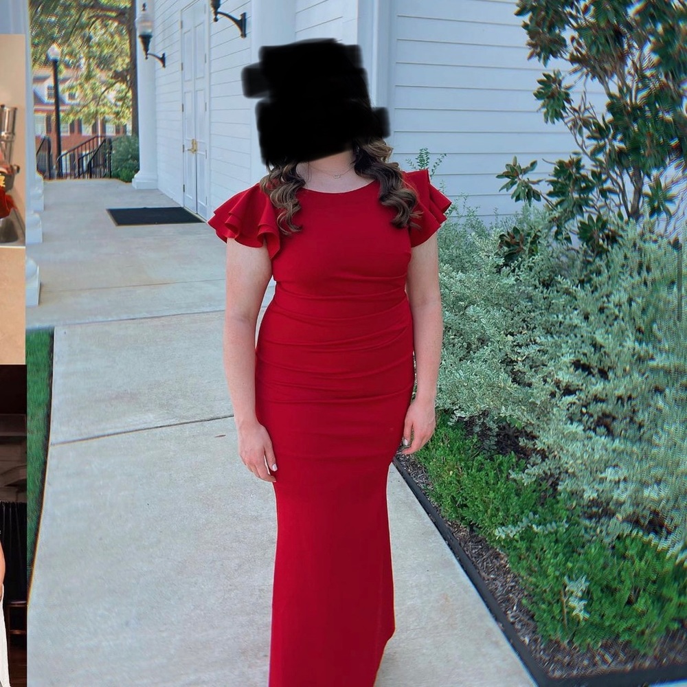 Red flutter sleeve long dress.